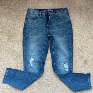 Distressed high rise skinny jeans